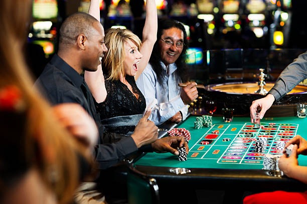 kingtogel live dealer at Casino Hold'em table with cards and chips visible